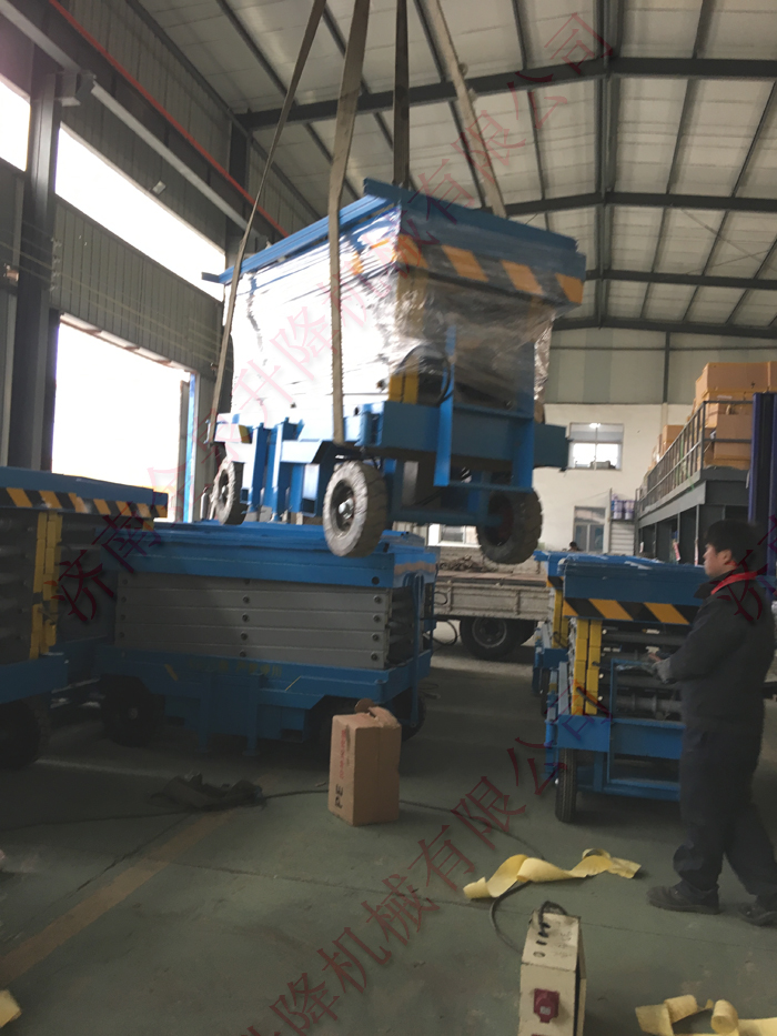 發(fā)廣東江門8m實(shí)心輪胎移動升降機(jī)